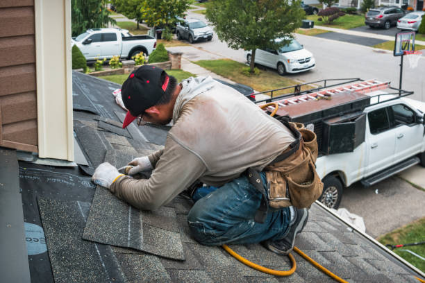 Professional Storm Damage Roof Repair technician working in Aurora, IL